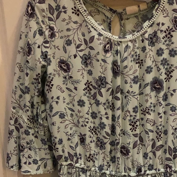This is a short, flowy, flower patterned dress from GAP. - Picture 3 of 5